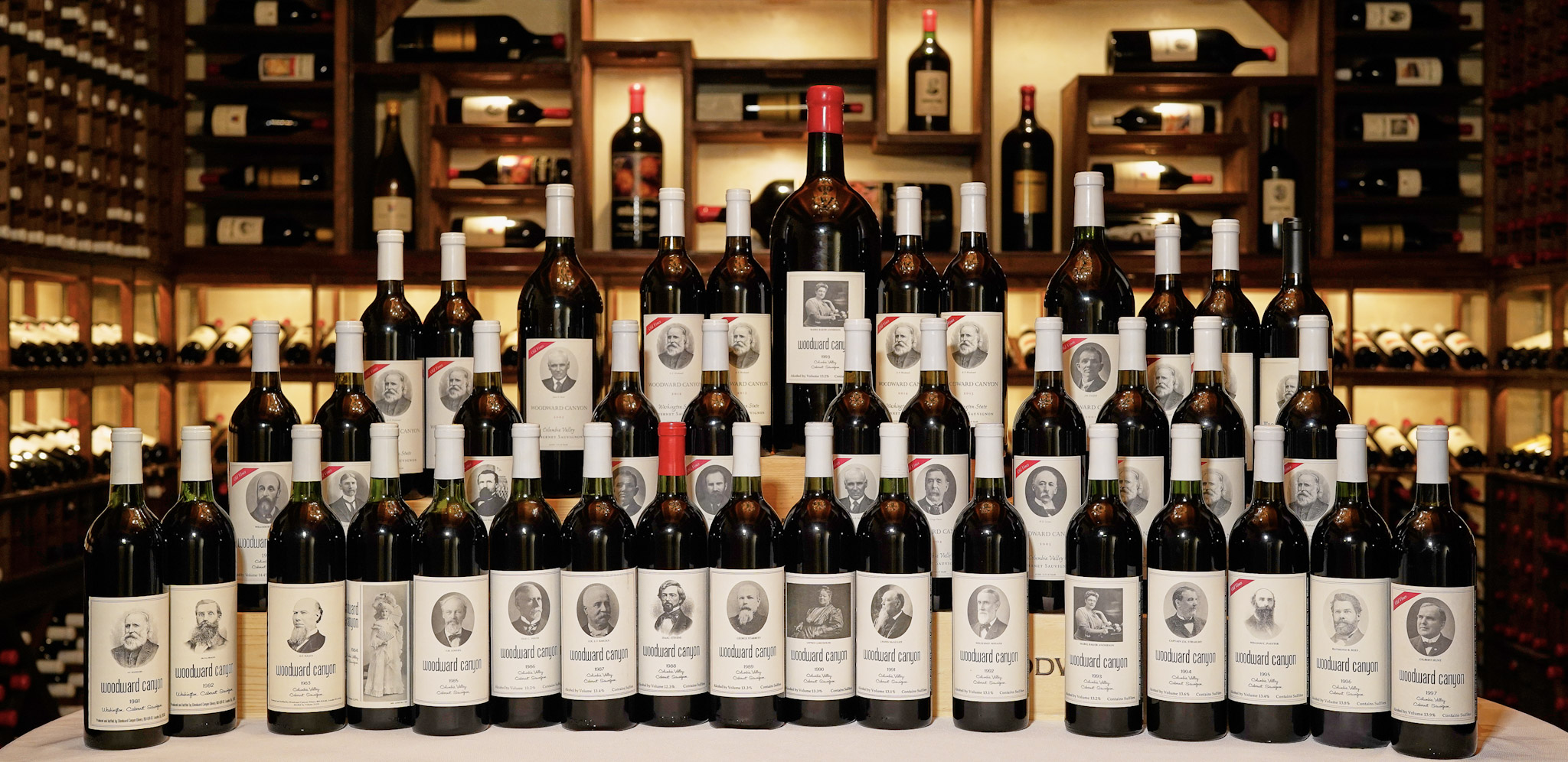 26 fine wines displayed in a row