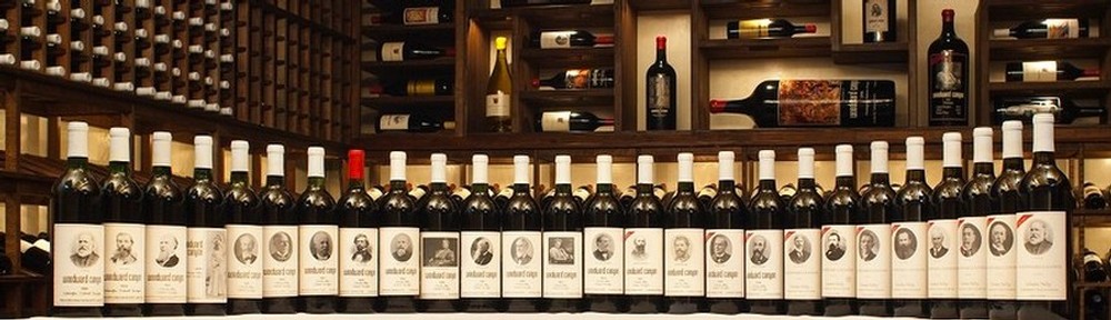 26 fine wines displayed in a row